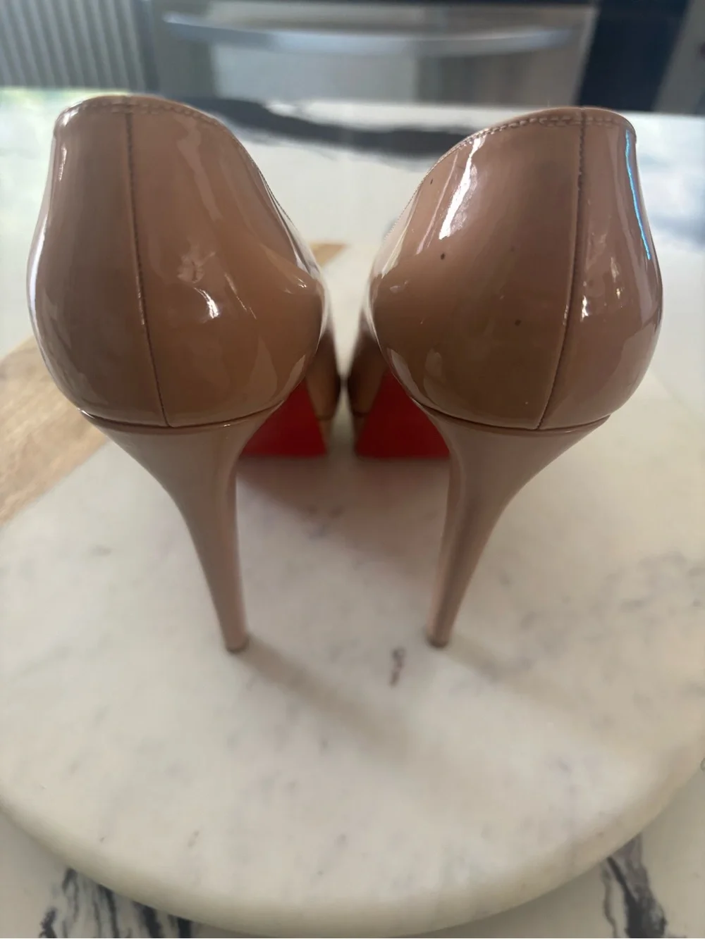 Christian Louboutin Patent Leather Nude Pumps